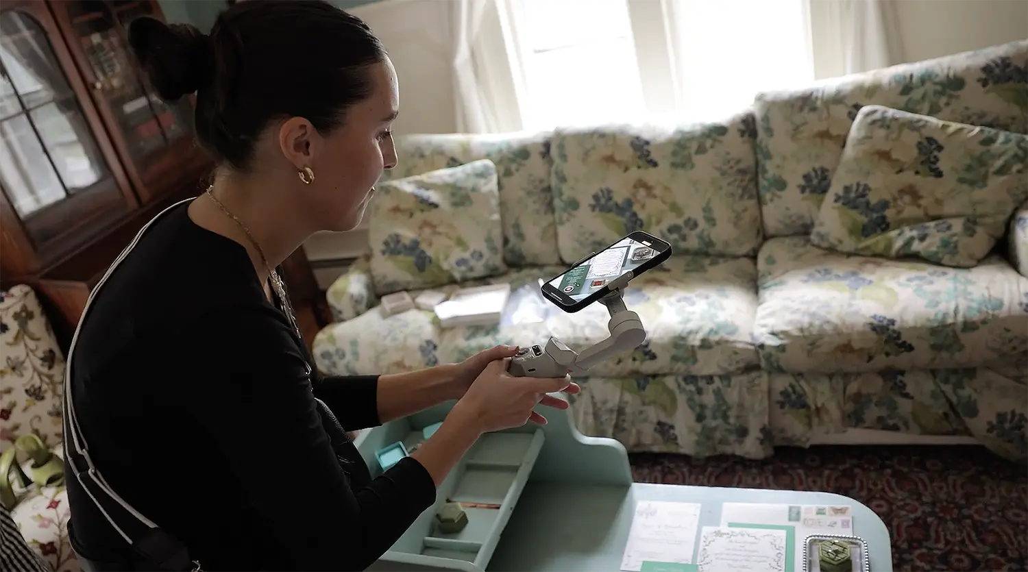 Wedding content creator Mariah filming iPhone footage during bride prep at Lenox Massachusetts wedding